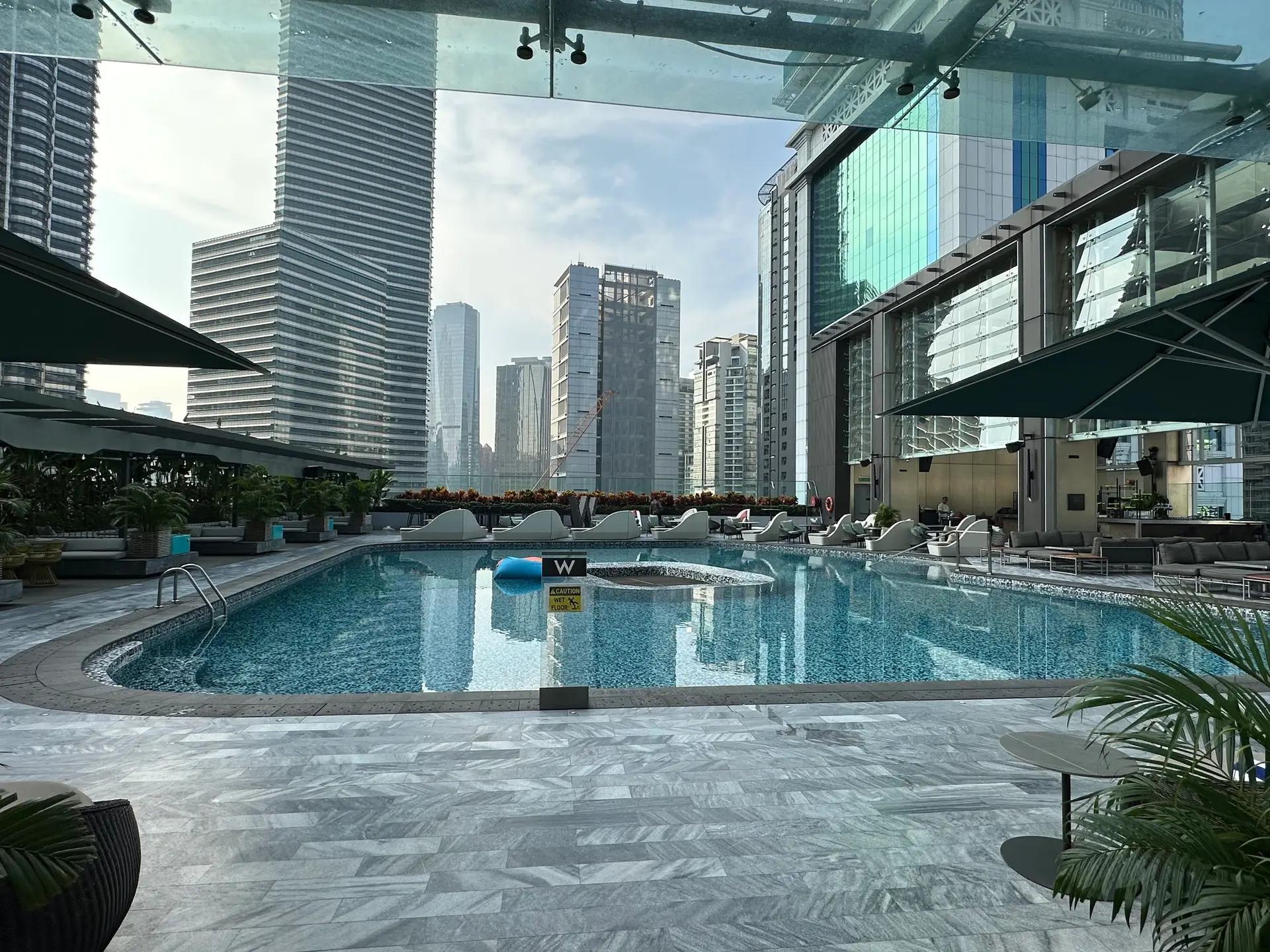 WET Deck pool at W Kuala Lumpur overlooking the Petronas Twin Towers